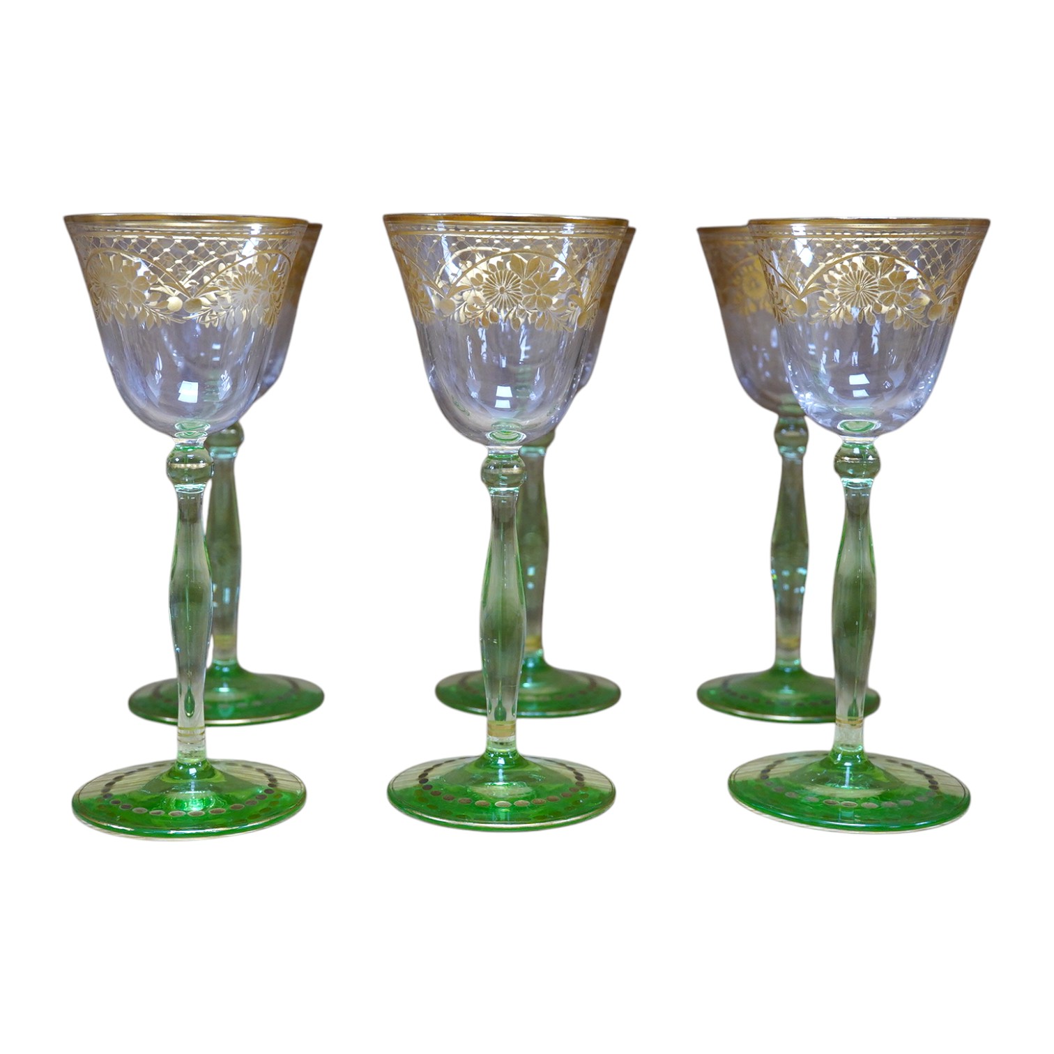 A set of six Bohemian wine glasses with ornate gilt decorated bowls, height 19cm. Condition - good